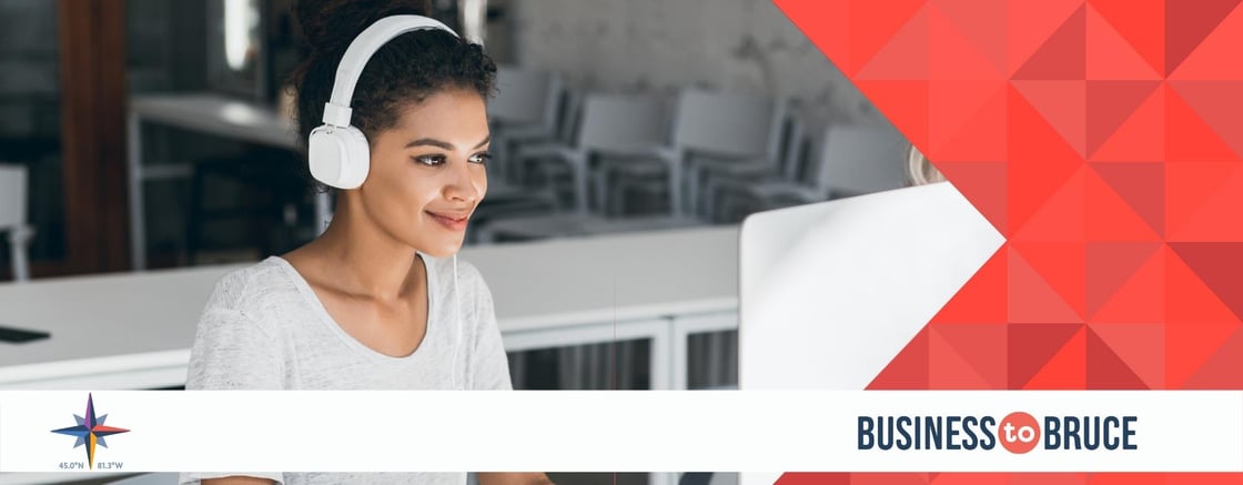 Woman watching online webinar.